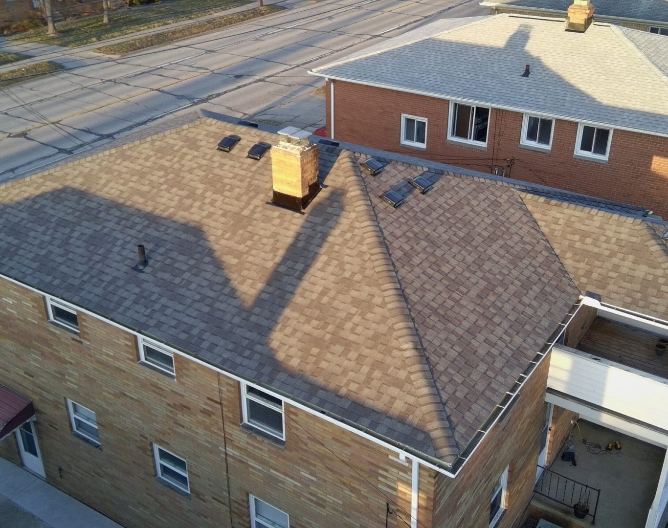 Diamond Roofing Pros replacing old shingles