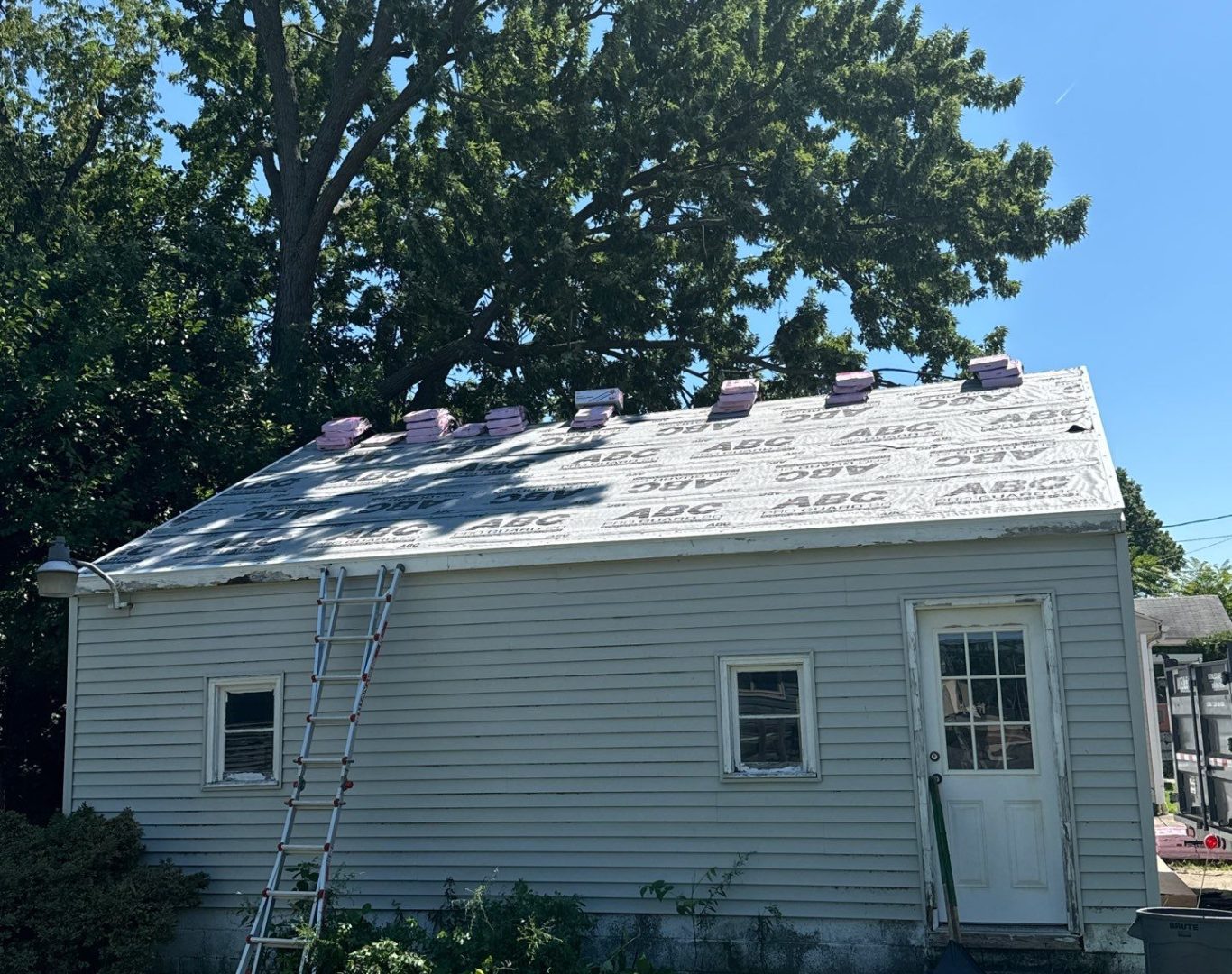 Roof replacement team installing shingles in Euclid, OH