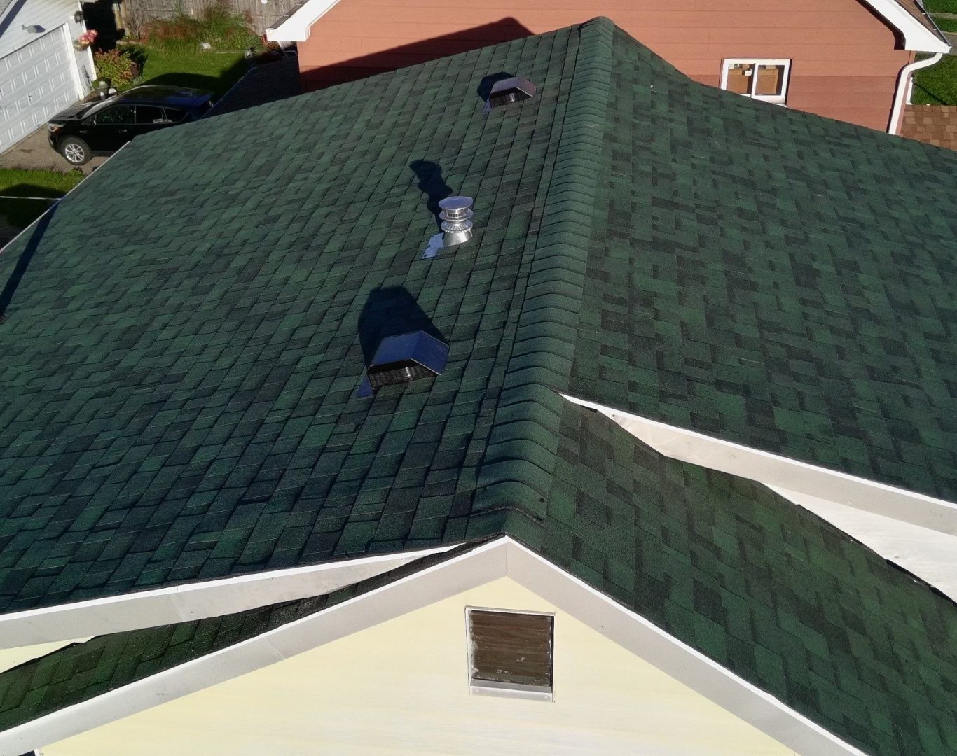 Diamond Roofing Pros expert technicians repairing residential shingles.