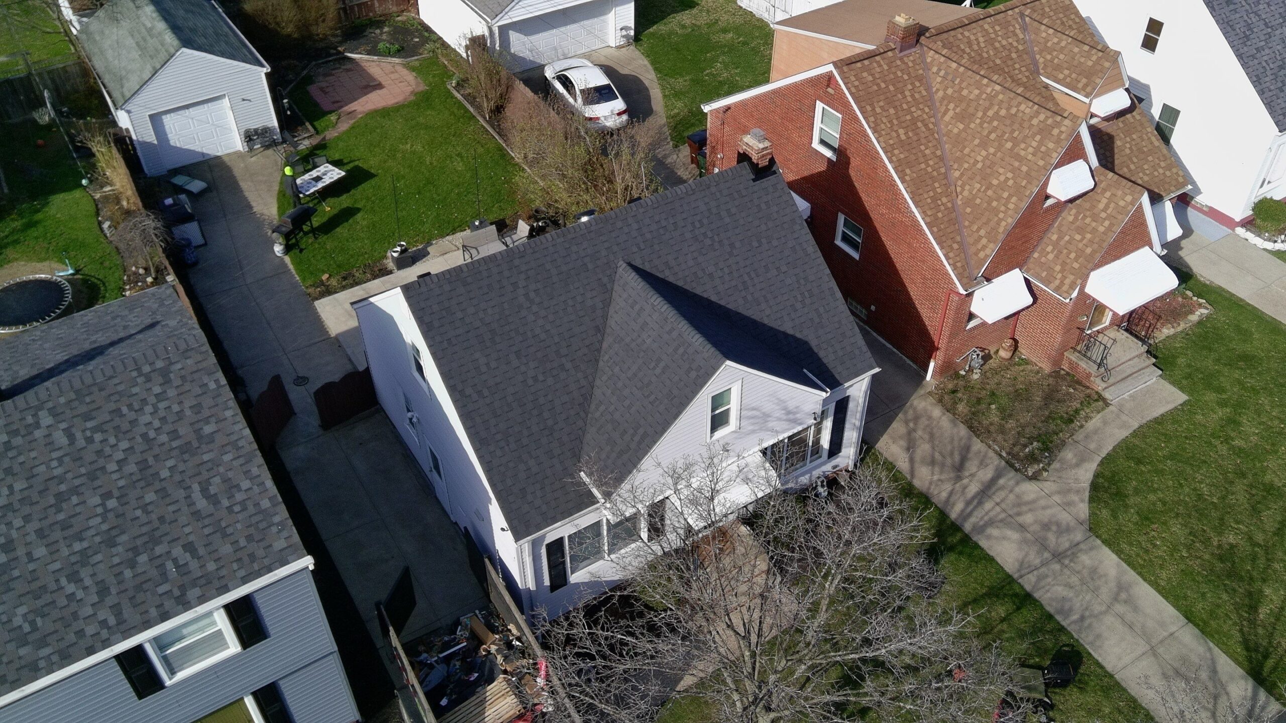 Diamond Roofing Pros repairing flat roof