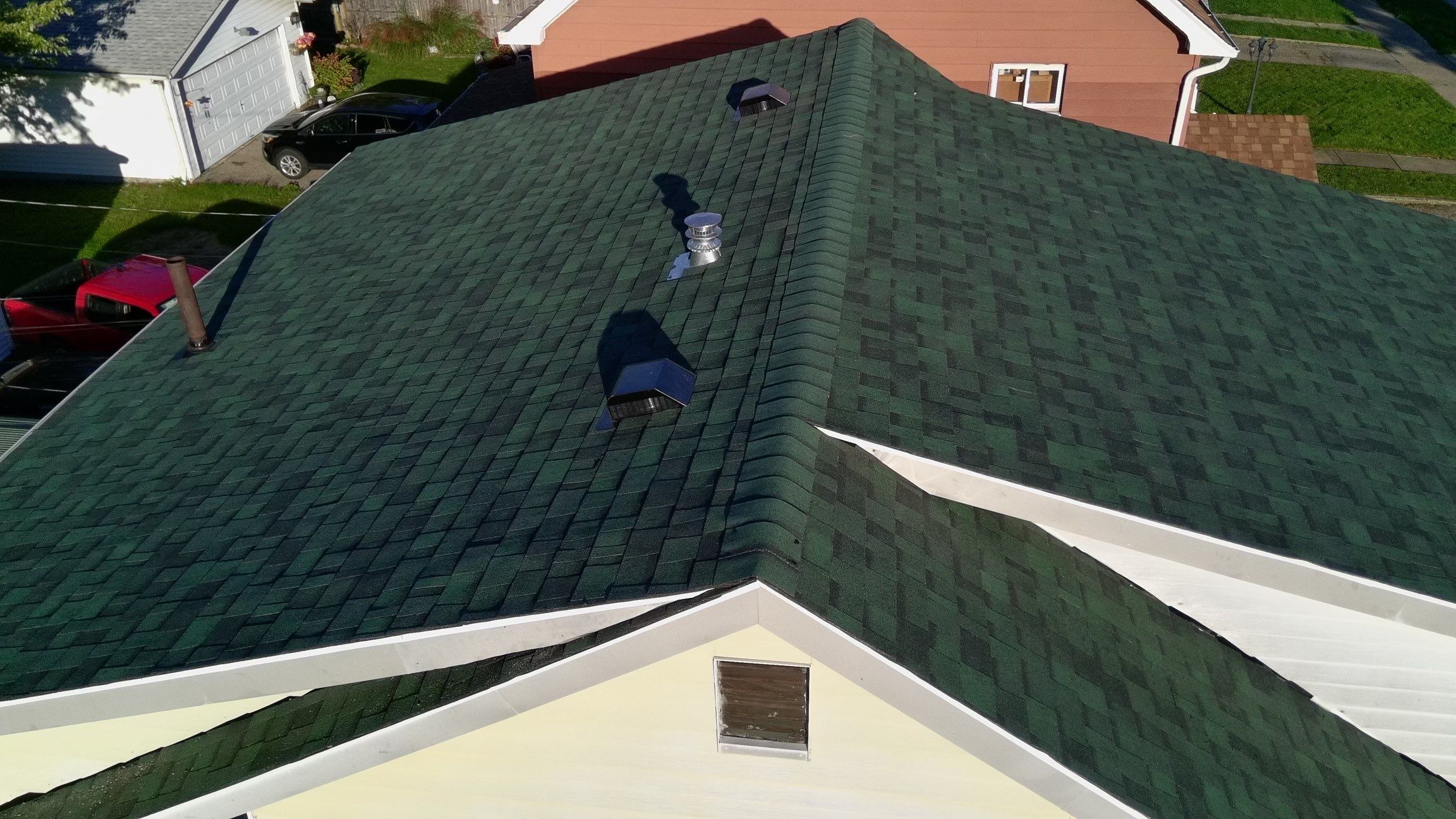 Diamond Roofing Pros expert technicians repairing residential shingles.