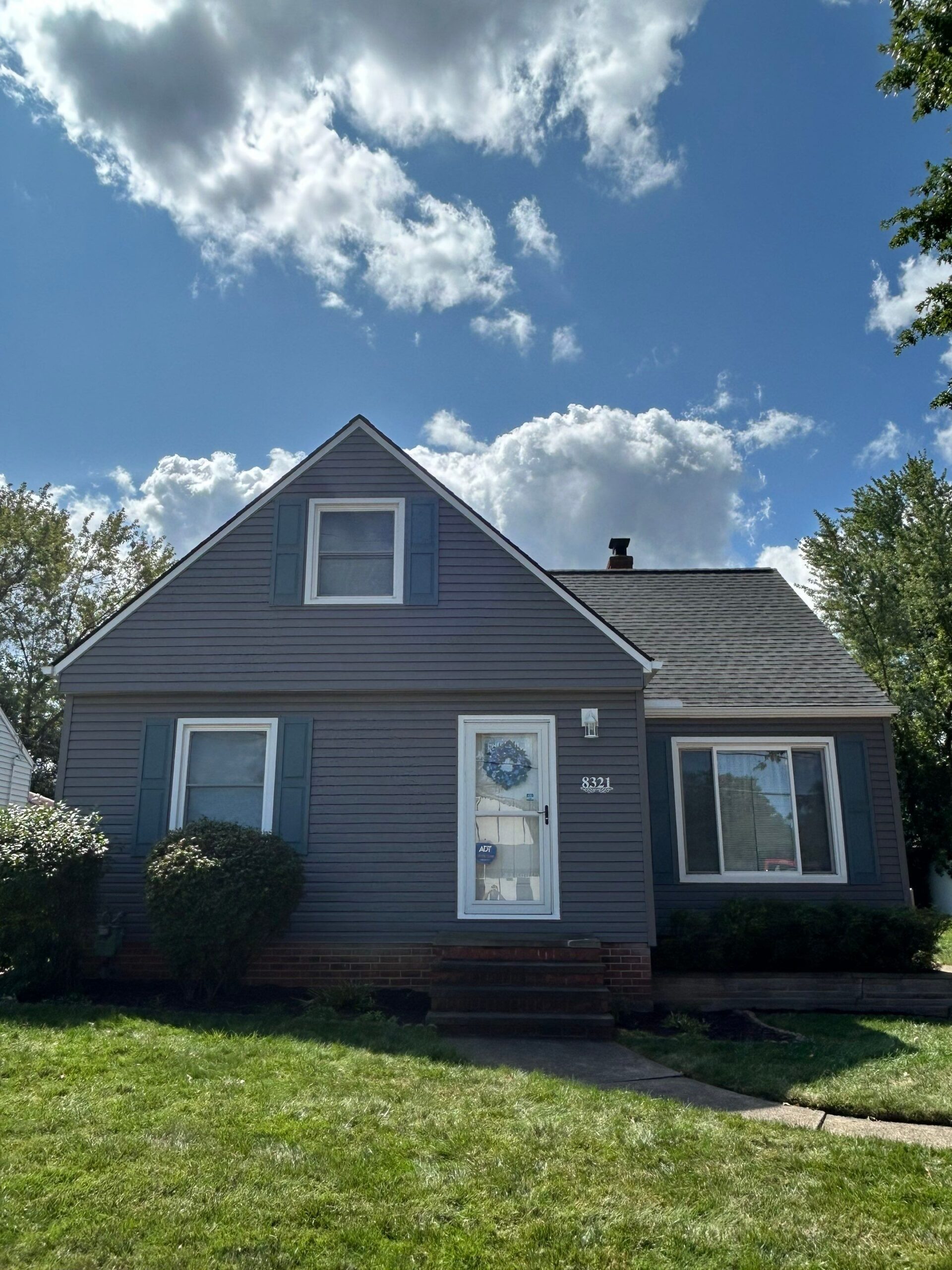 Close-up of newly replaced and sealed roof tiles by Diamond Roofing Pros.